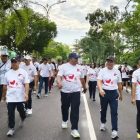 Wakil Ketua I DPRD Kapuas, Yohanes bersama Kapolres dan Pj Sekda saat menggikuti acara jalan santai Hari ke-79 Bhayangkara.